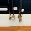 plant/Rutile in quartz pendants-0-thumbnail