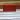 663. Embossed red coach passport holder thumbnail
