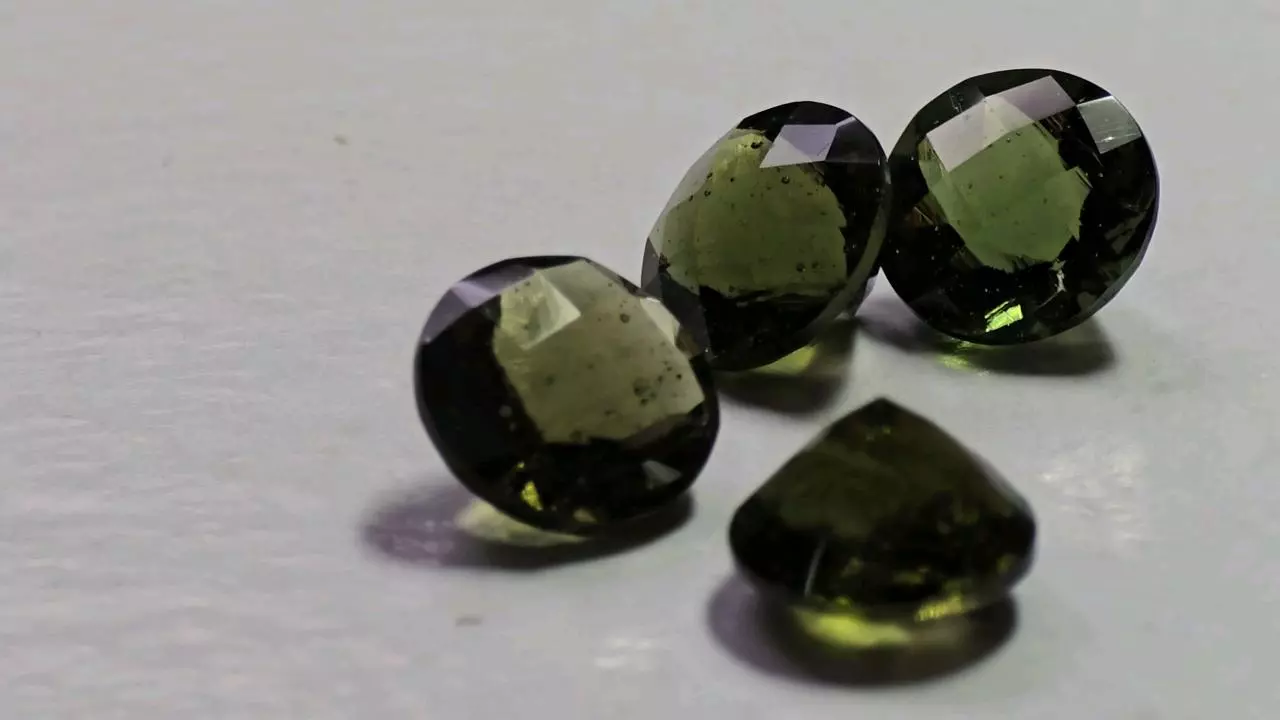 plant/Moldavite roughly 1.5ct 8 mm c b sold separately price for one-1