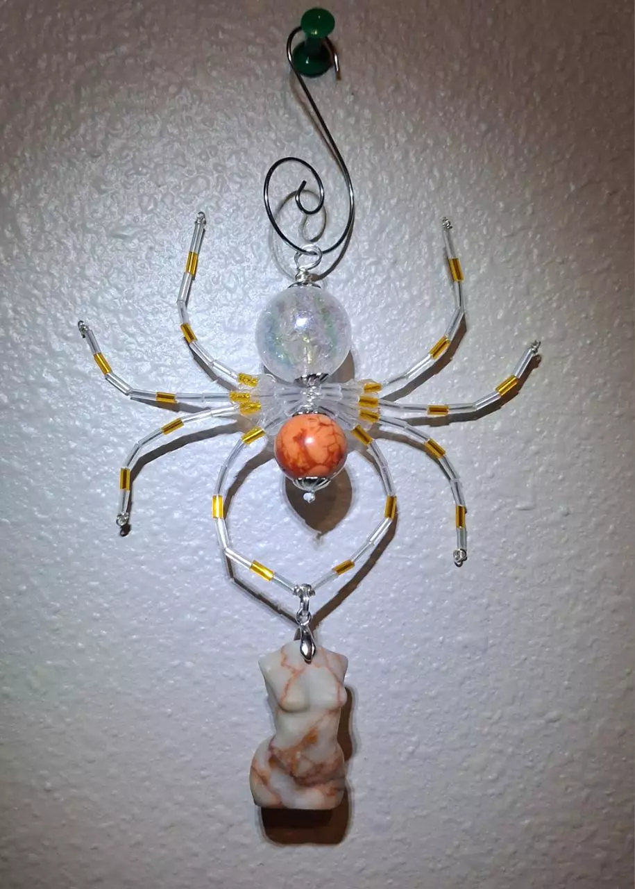 plant/Spider ornament w/ red vain laby body-0