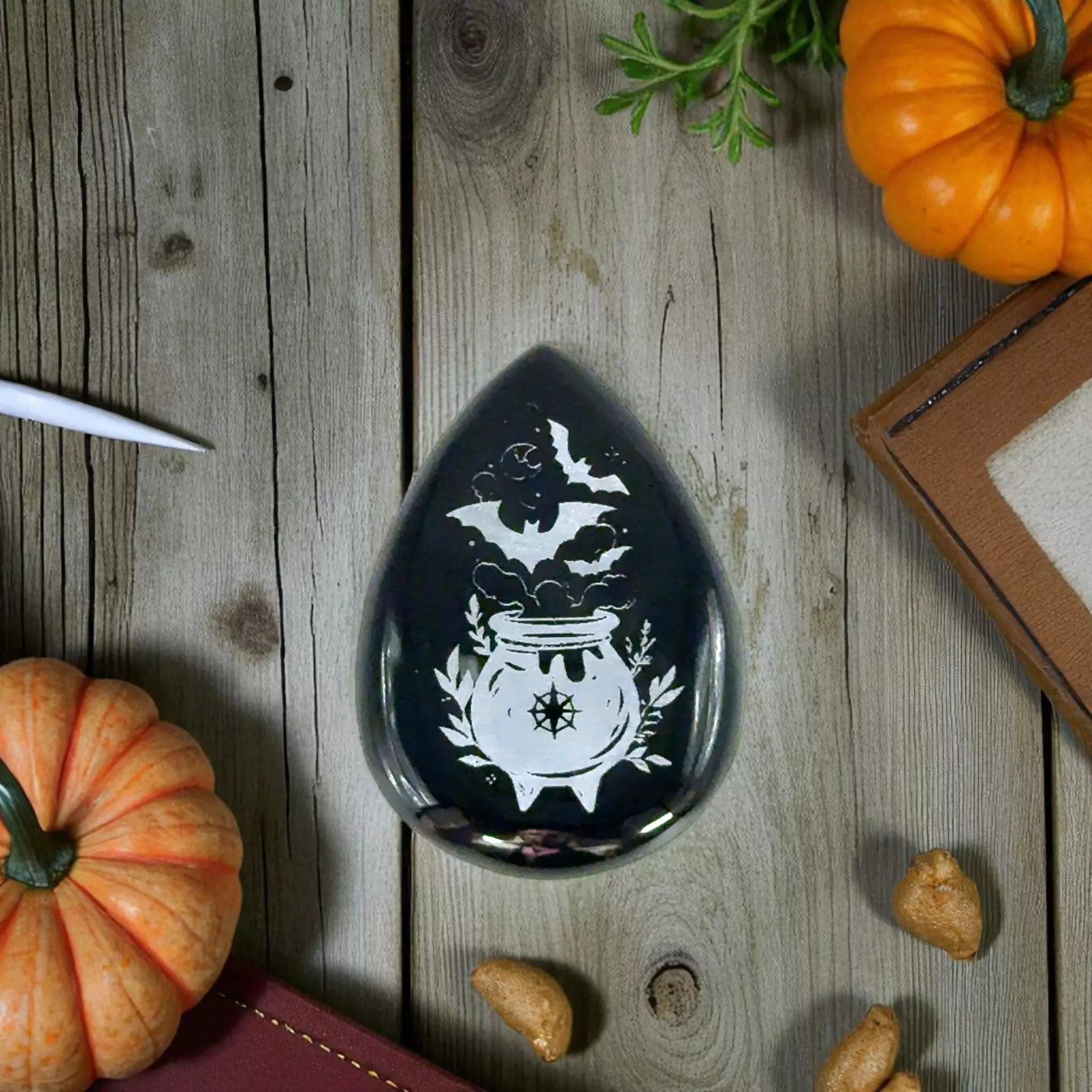 plant/37.02 Carat Pear-Shaped Engraved Black Onyx Gemstone-0