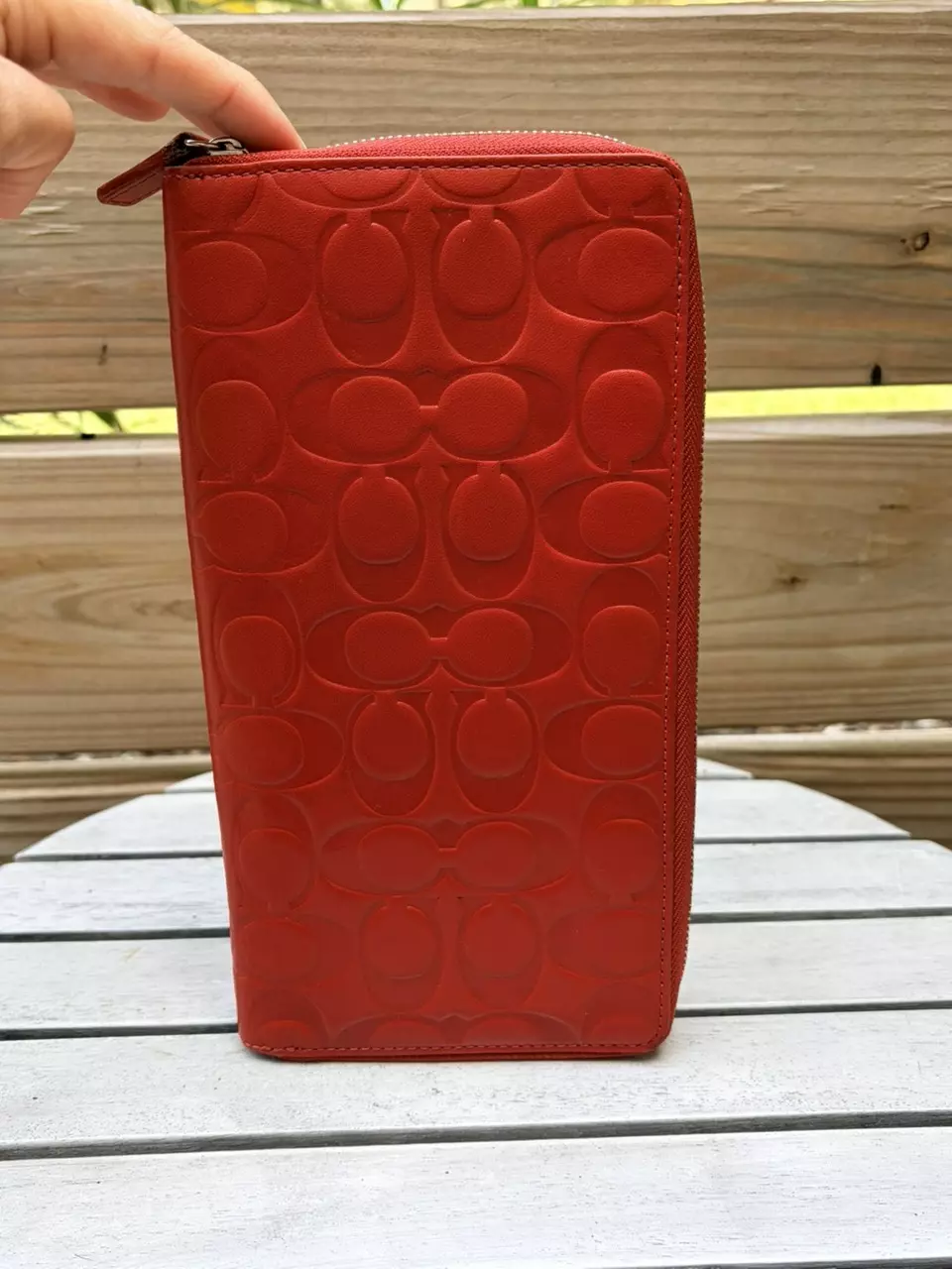 plant/663. Embossed red coach passport holder-1