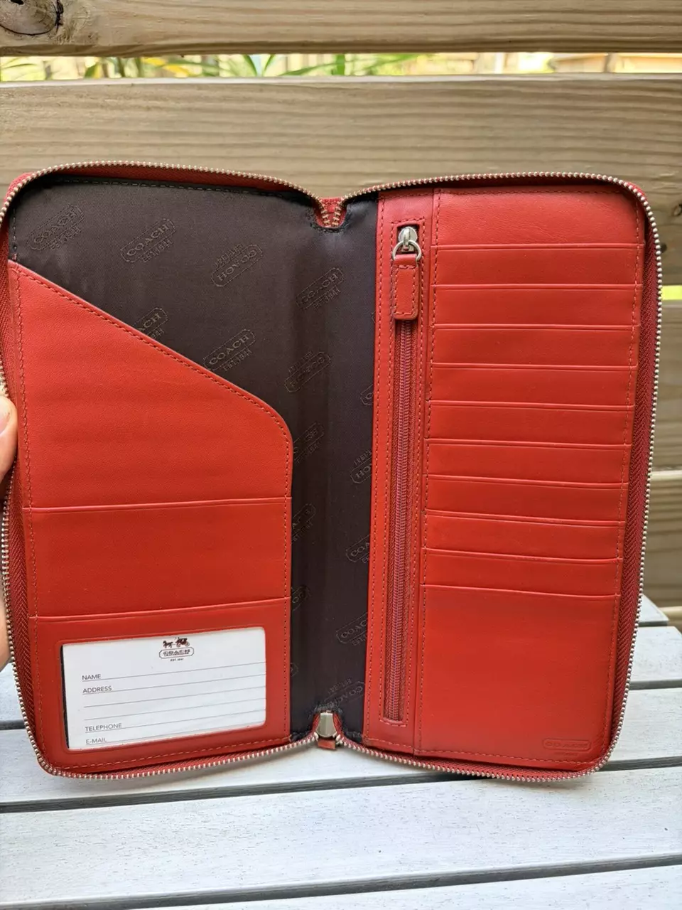 plant/663. Embossed red coach passport holder-2