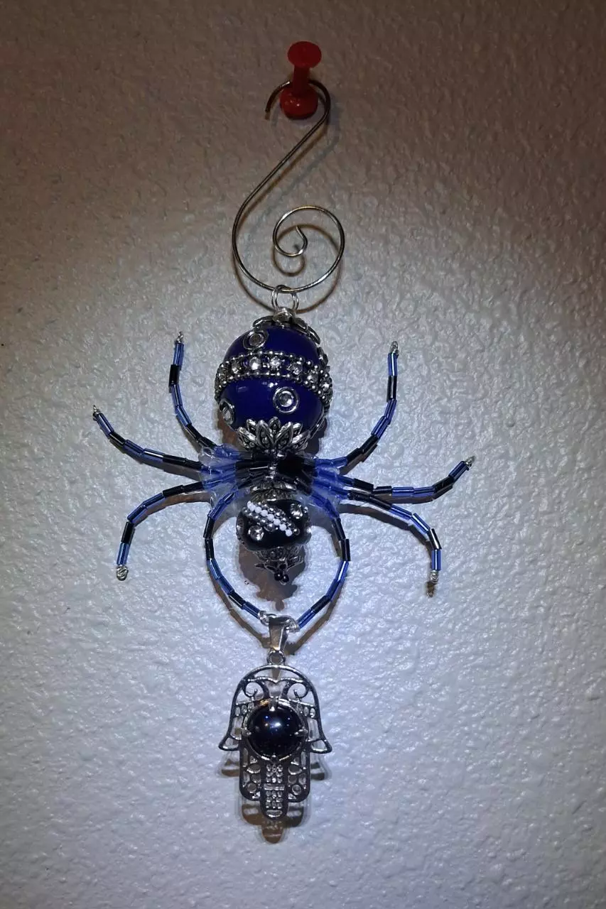 plant/Spider ornament w/ hamsa hand-0