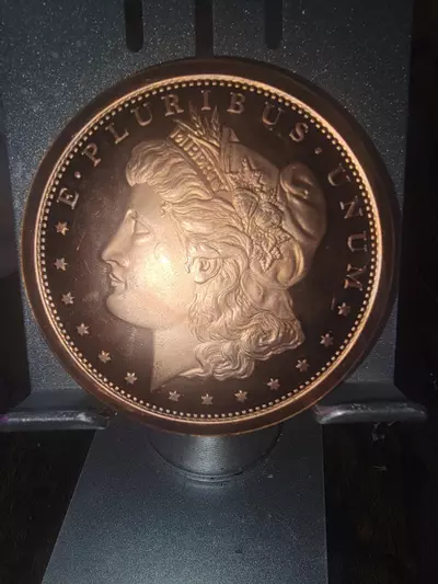 plant/5 oz copper round replica of the Morgan Dollar.-0-thumbnail