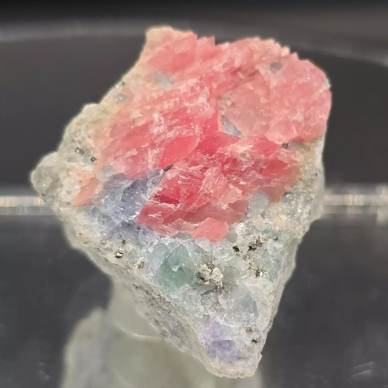 plant/Rhodochrosite w Fluorite from sweetwater mine-1