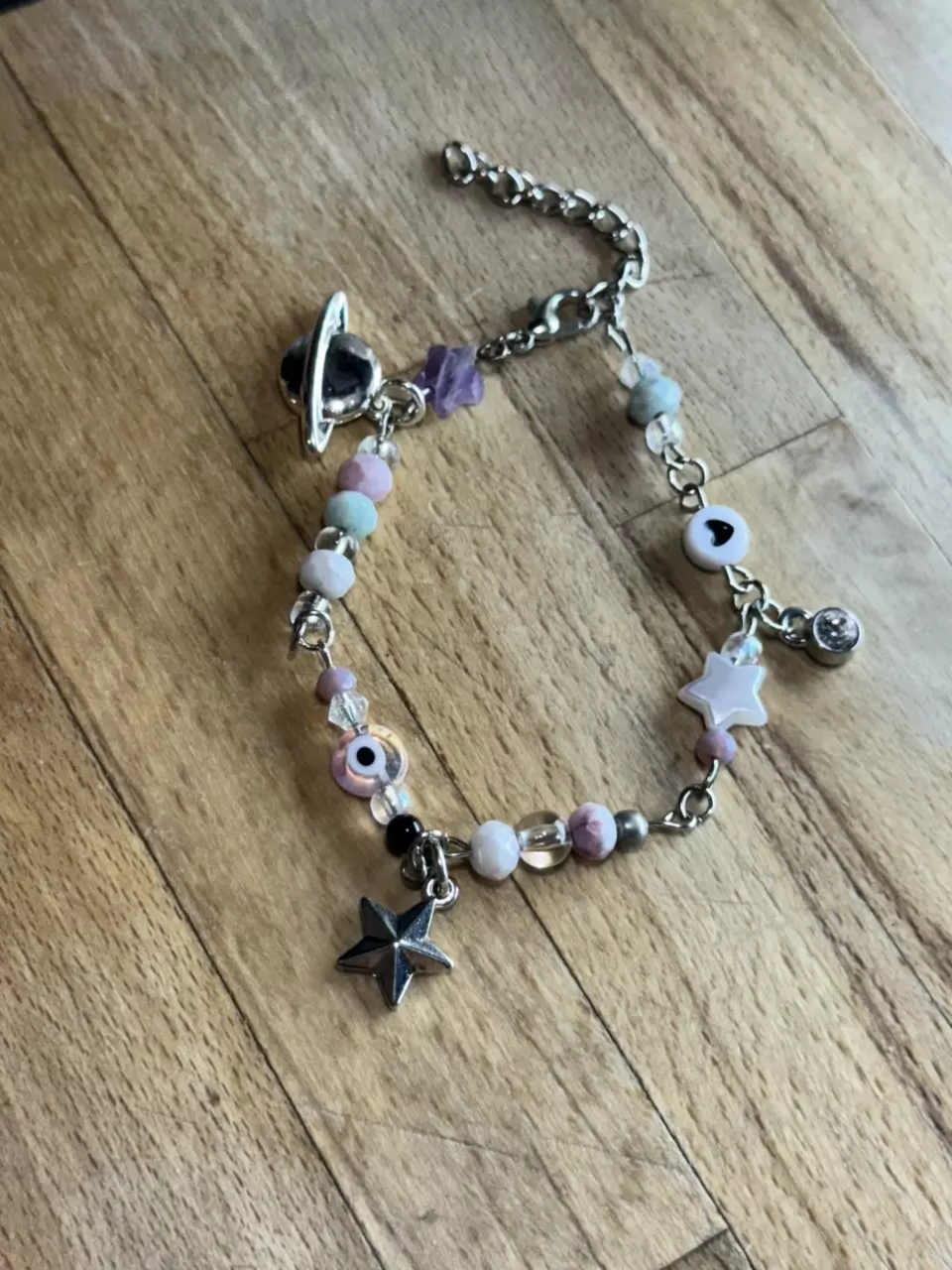 plant/Beaded Bracelet with Star and Saturn charm-0