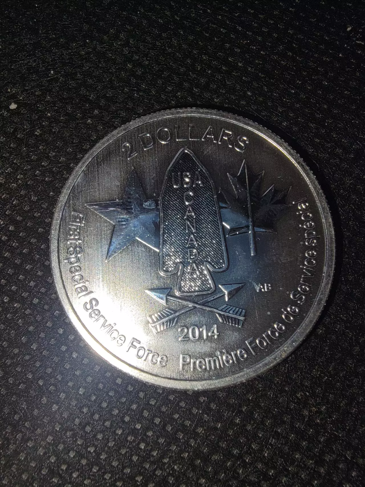 plant/2014 Royal Canadian Mint 1/2 oz Silver $2 "Devil's Brigade" coin.-0