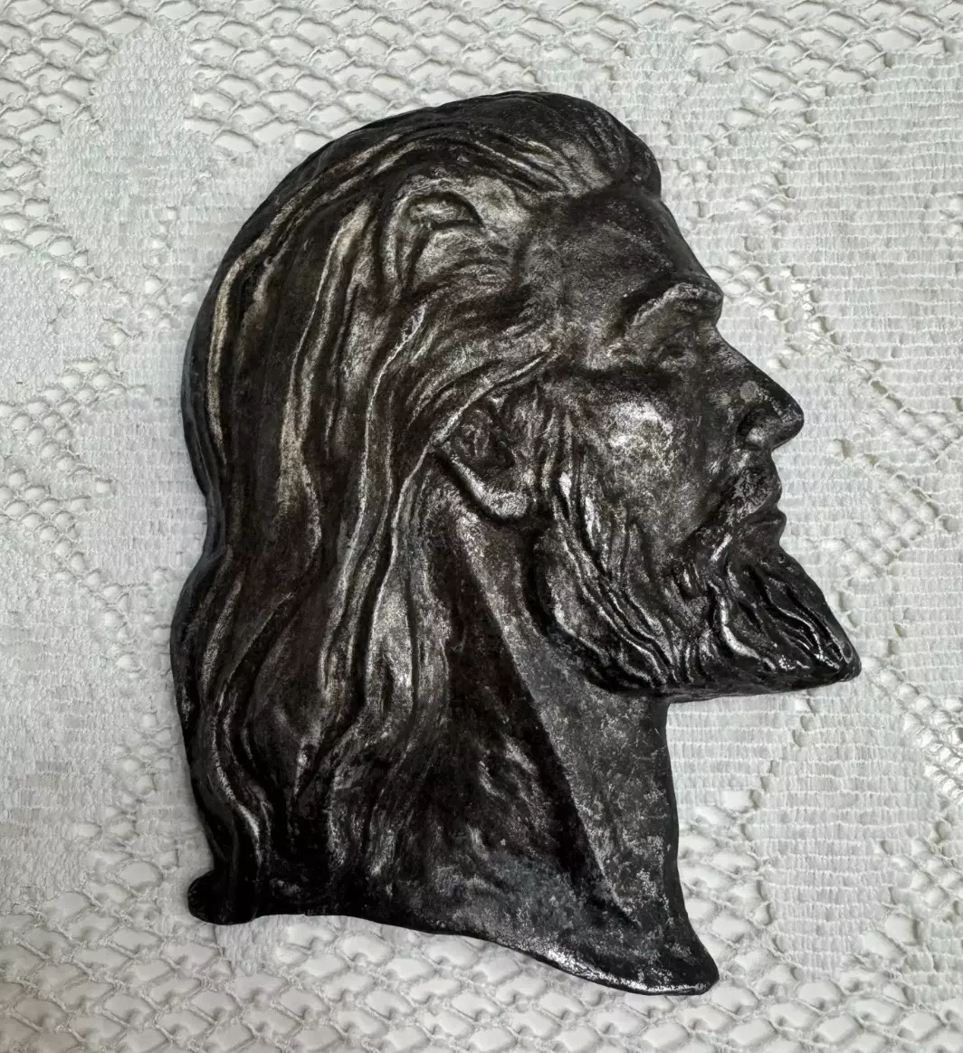 plant/Jesus head cast metal 6.5” x 5.25-0