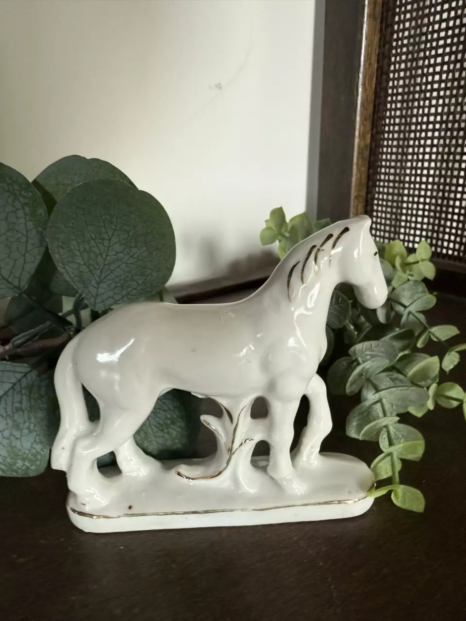 plant/White porcelain horse figurine-0