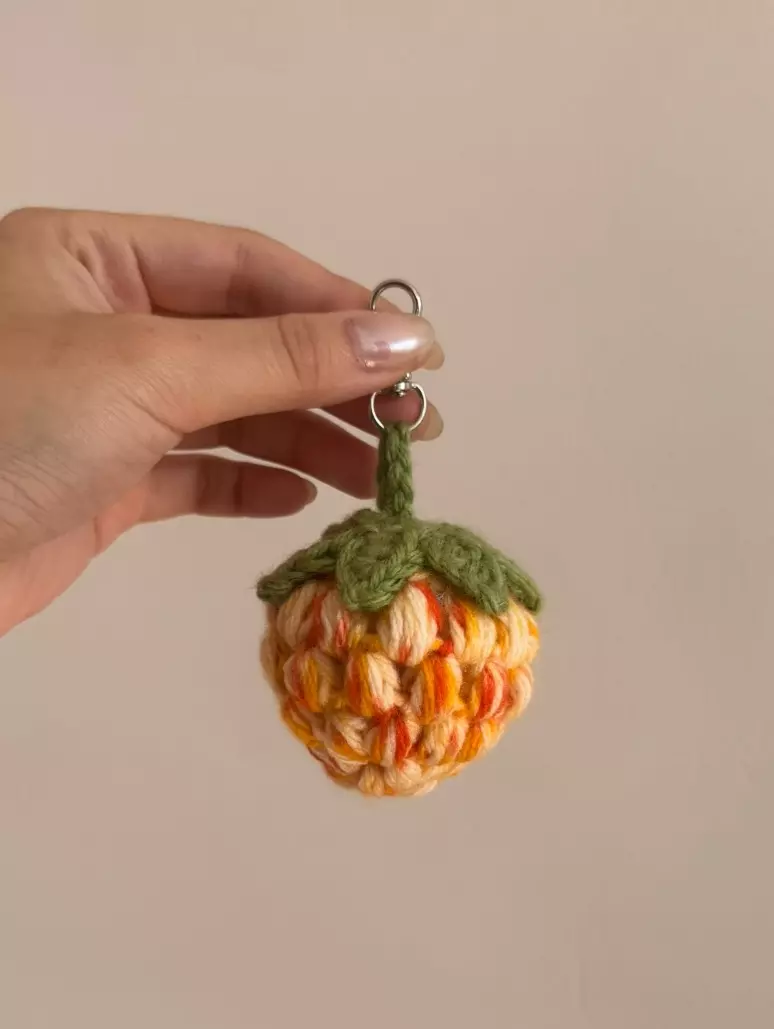 orange strawberry puff keychain thumbnail