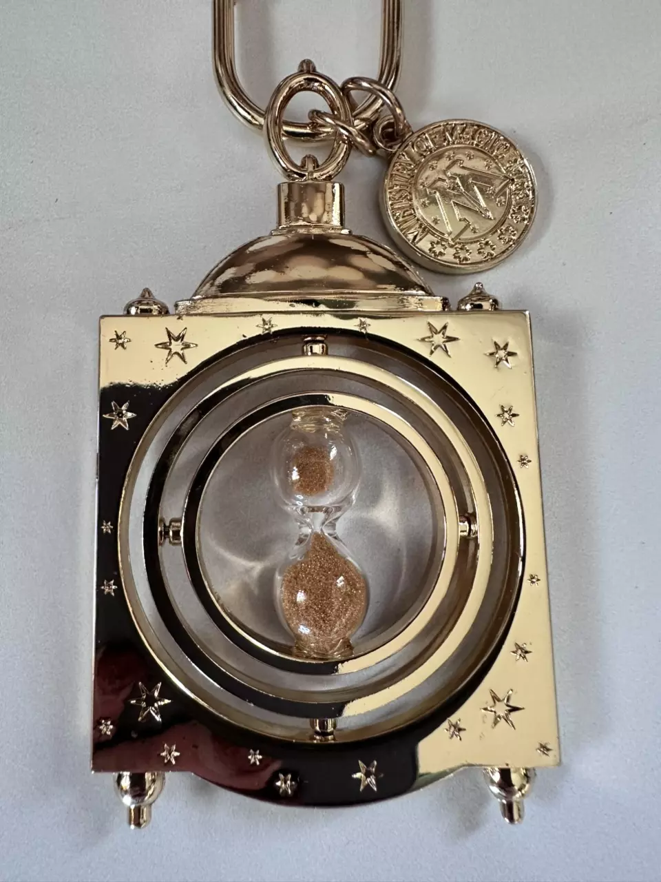 Merch:  Epic Universe time turner keychain/charm thumbnail