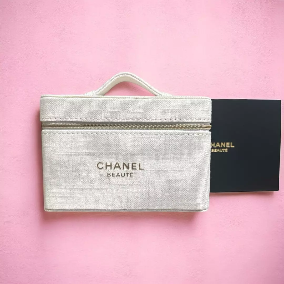 Chanel Beauty white woven makeup bag or cosmetic case. thumbnail