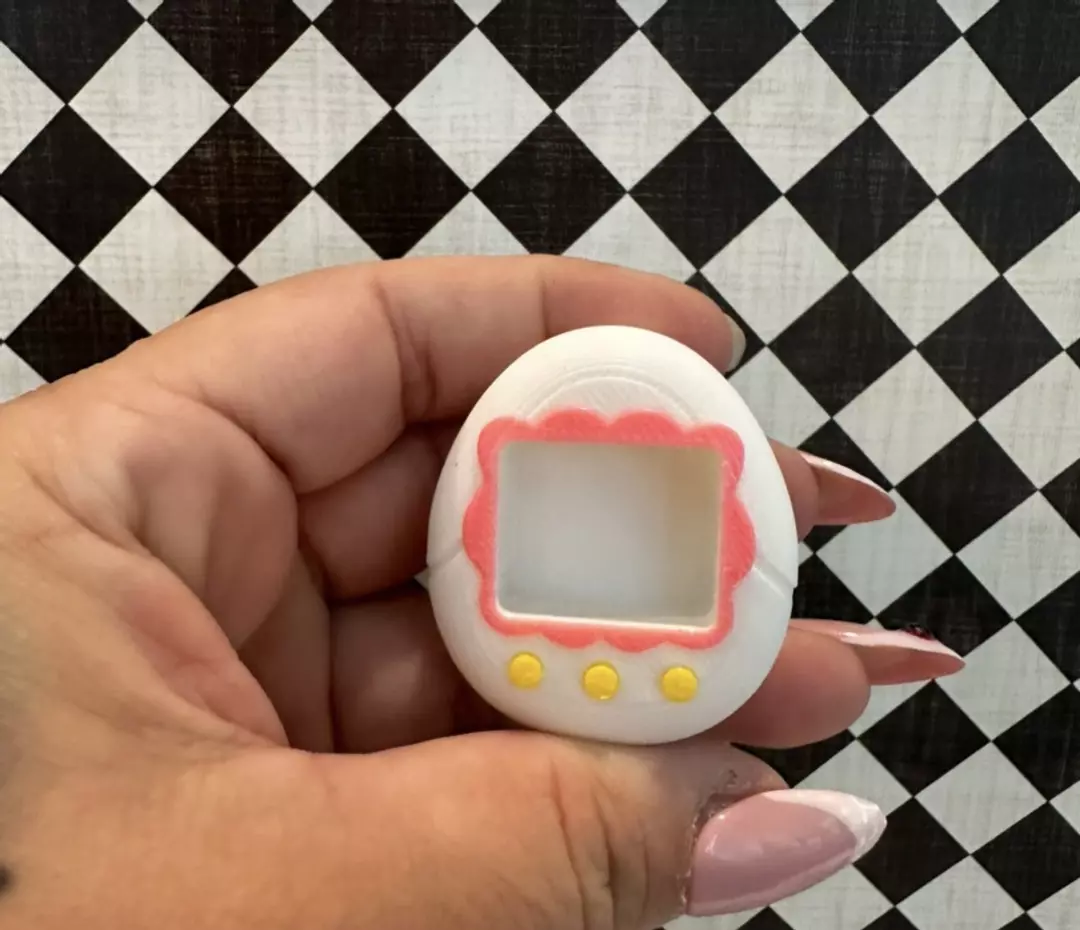 Small white & pink Tamagotchi hide thumbnail