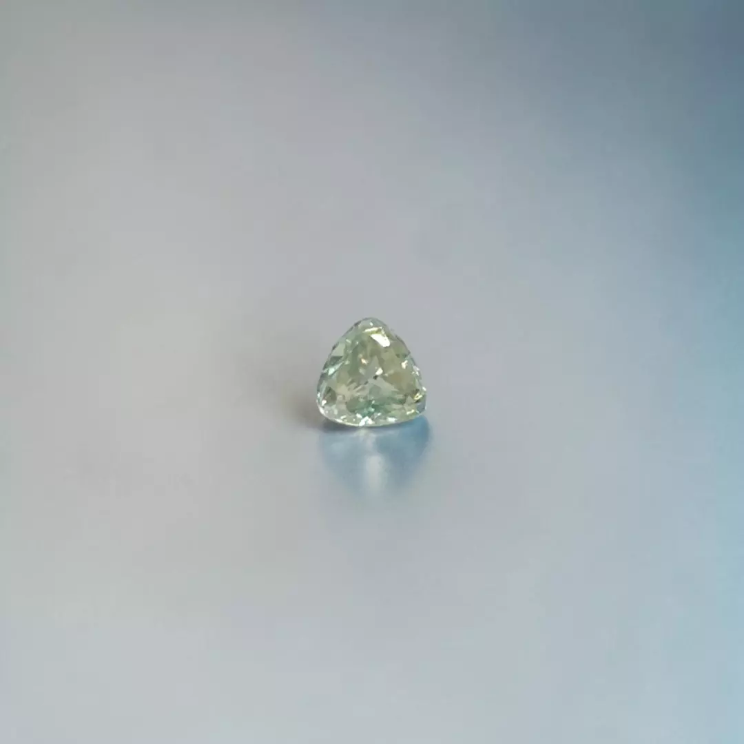 0.91 Carat Trillion Cut Greenish Moissanite Gemstone - Live Show Listing thumbnail