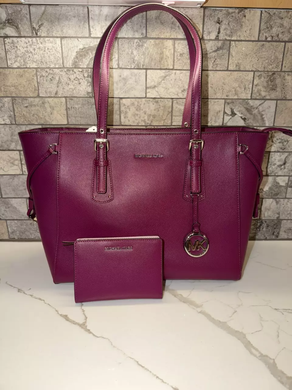 Michael Kors Voyager Tote with a matching wallet thumbnail