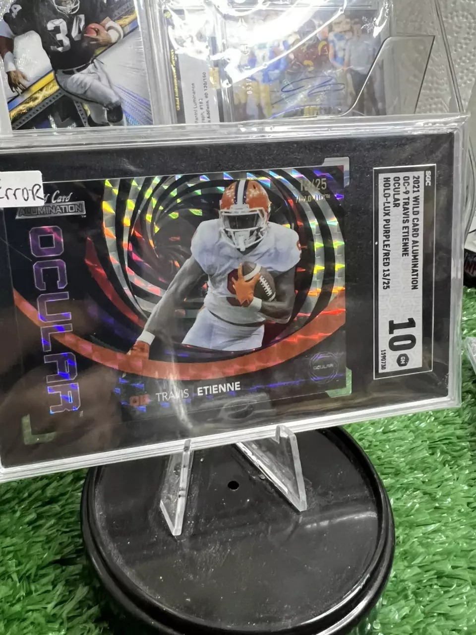 SGC 10 2021 Wild Card Holo-Lux/25 Travis Etienne Rc Error Card thumbnail