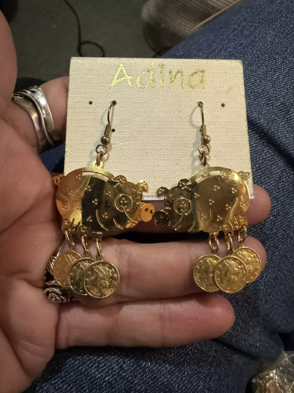Adina gold tone piggy bank and coin earrings thumbnail
