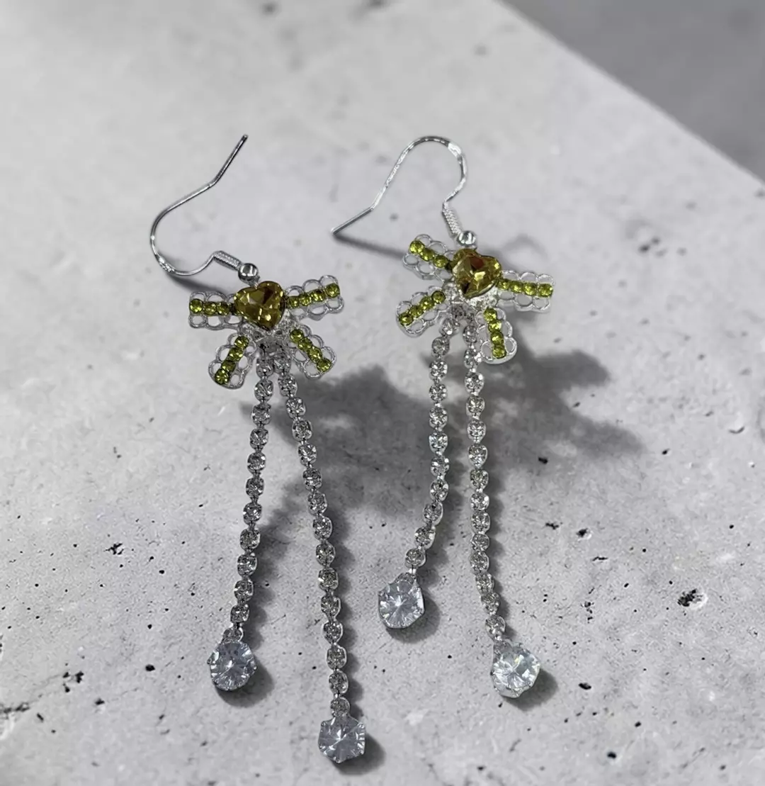 Golden Glimmer Bow Drop Earrings thumbnail