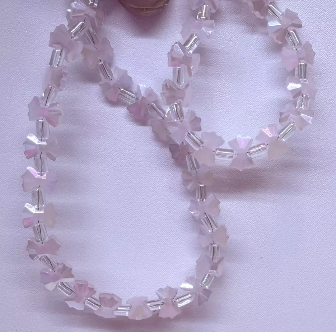 9x 7 mm glass pink 13 facet bows thumbnail
