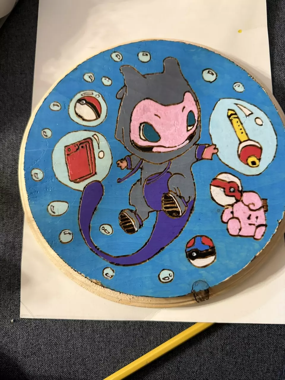 Mew wearing a mewtwo onezie thumbnail