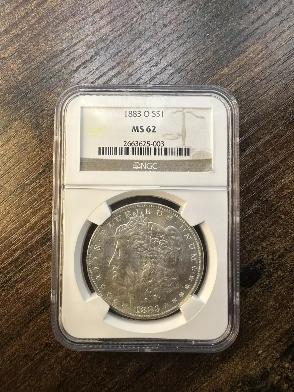 1885-O Morgan Silver Dollar Graded NGC MS63 thumbnail