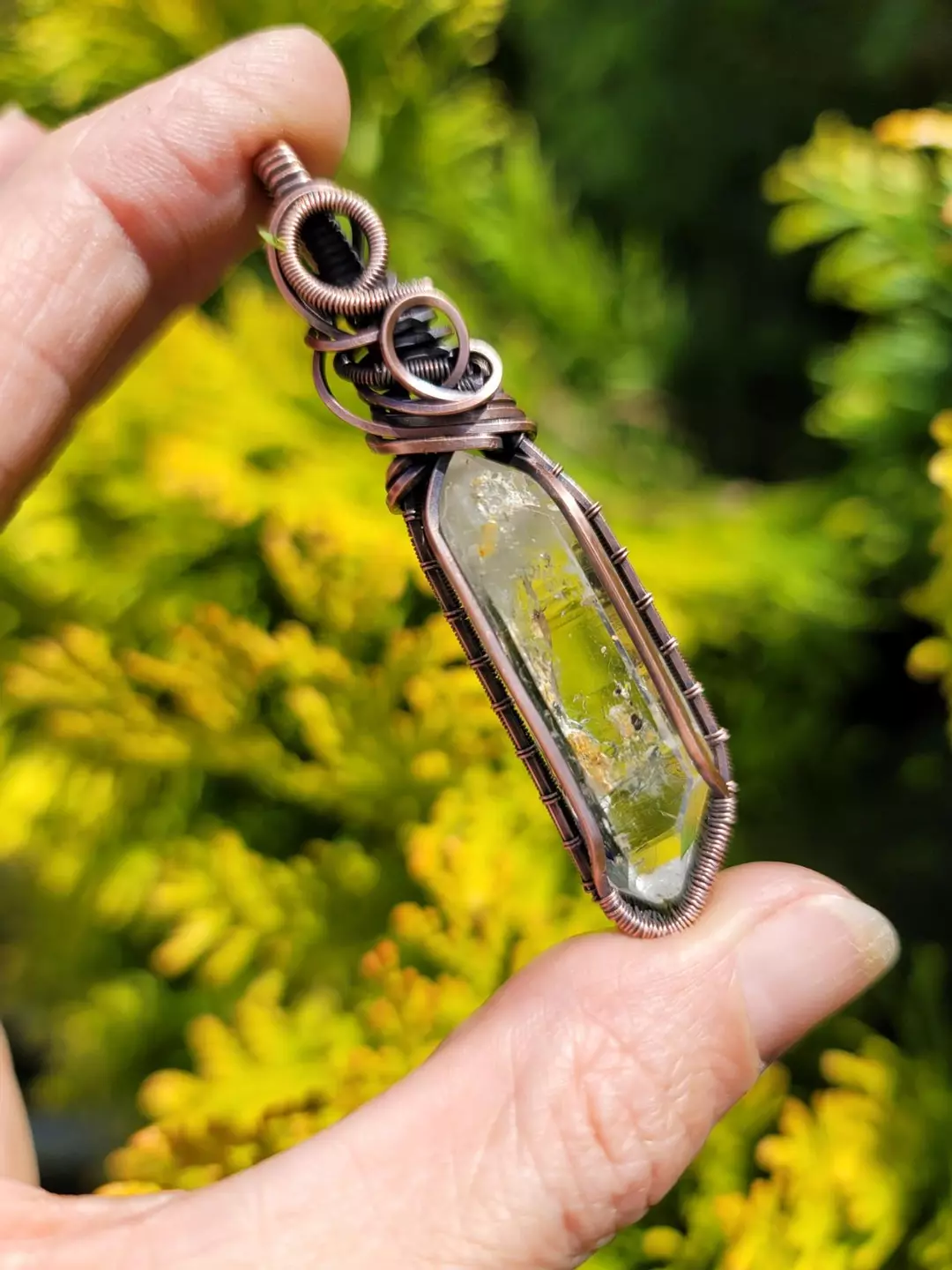 copper wrapped Enhydro quartz crystal pendant (small bubble but seen by eye) thumbnail