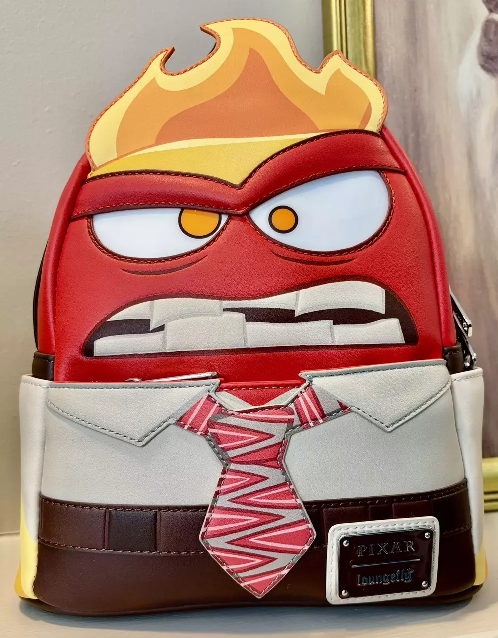 EXCLUSIVE DROP: Loungefly Inside Out Anger Cosplay Mini Backpack thumbnail