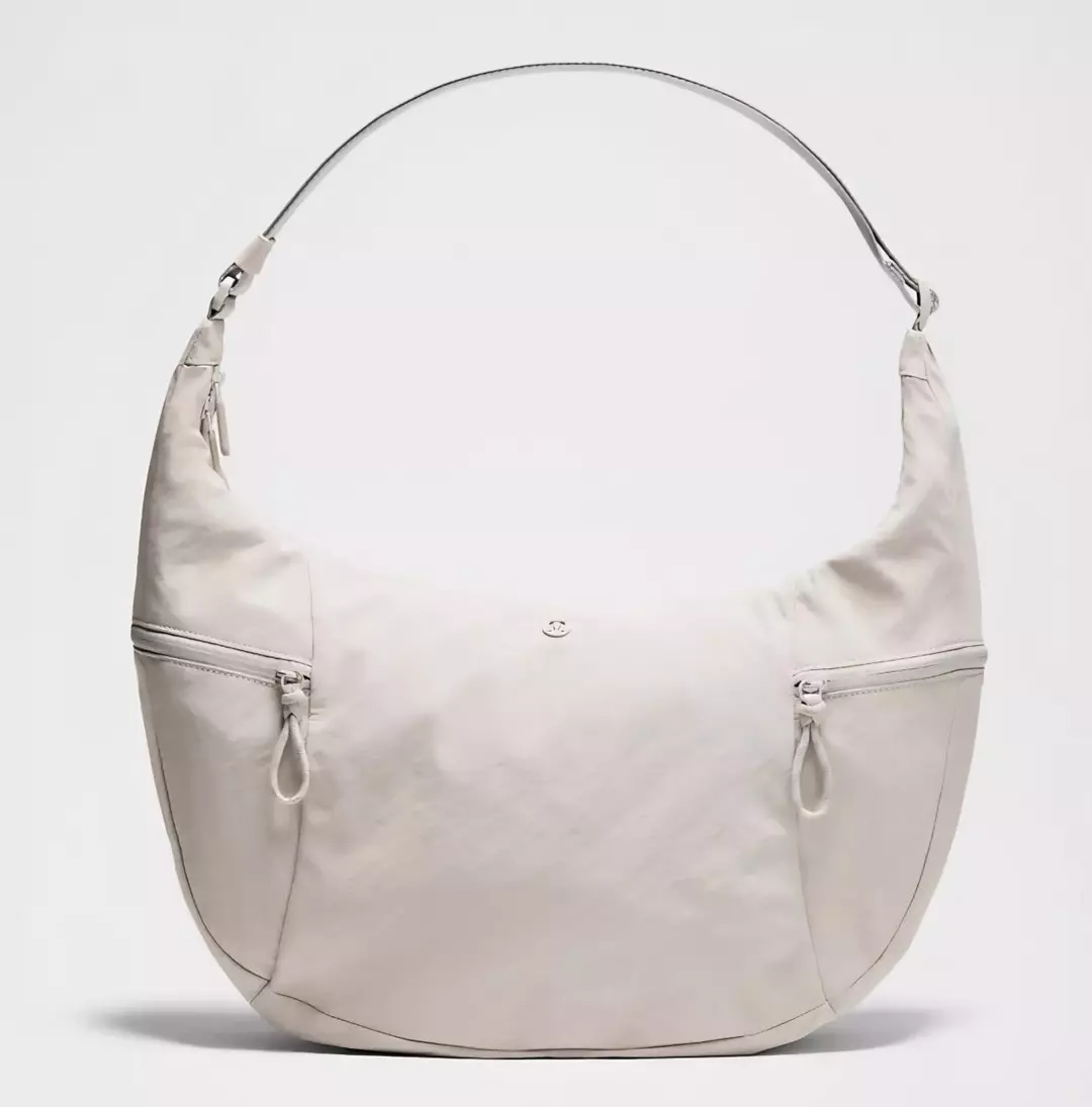 NWT Lululemon Large Slouchy Sling Bag 13L Ivory thumbnail