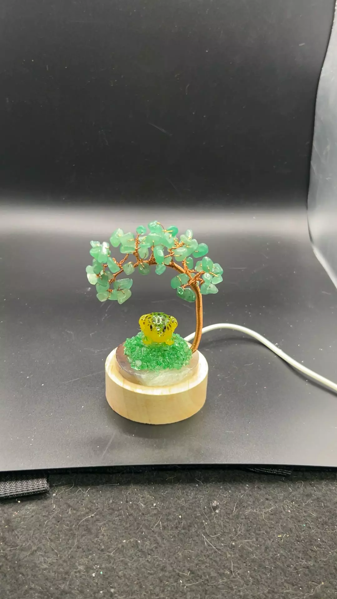 Green adventuring tree on light base with a little frog thumbnail