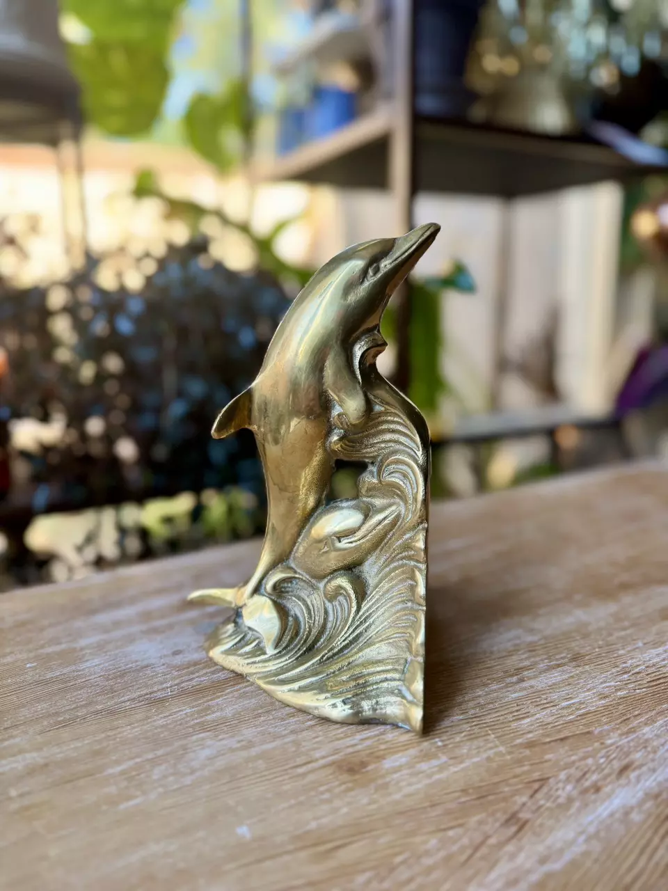 Brass dolphin bookend thumbnail