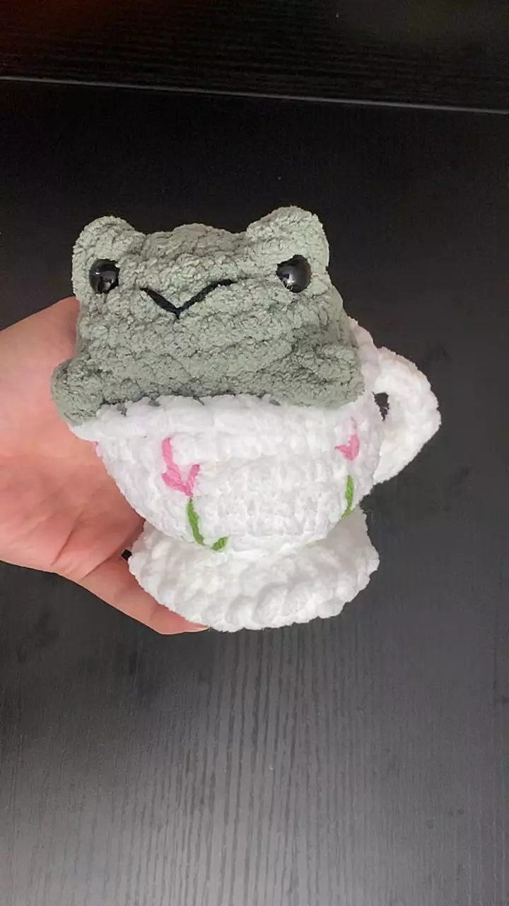 Frog in a teacup with embroidered flowers thumbnail