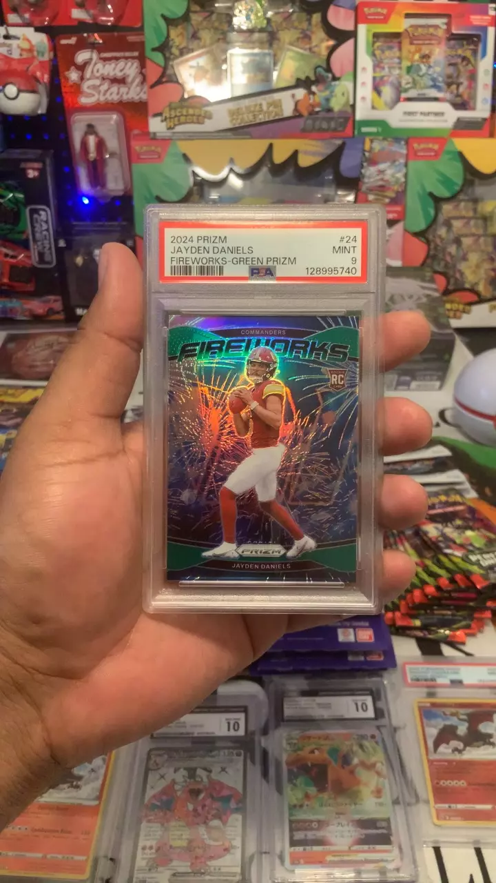 2024 Panini Prizm-Fireworks Jayden Daniel’s RC PSA 9 thumbnail