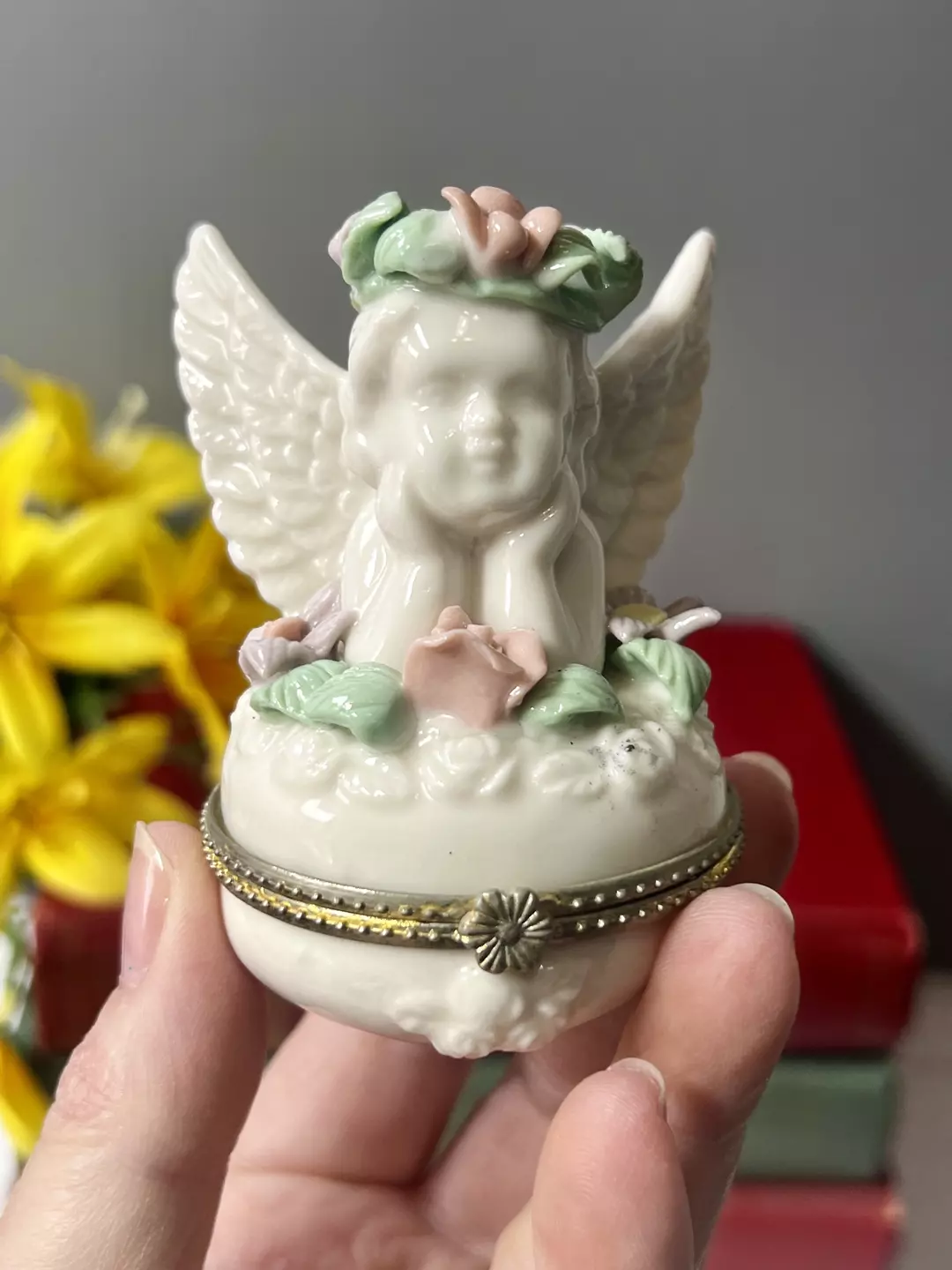 J04. Lovely White Ceramic Cherub Hinged Trinket Box with a Multicolor Flower Crown thumbnail