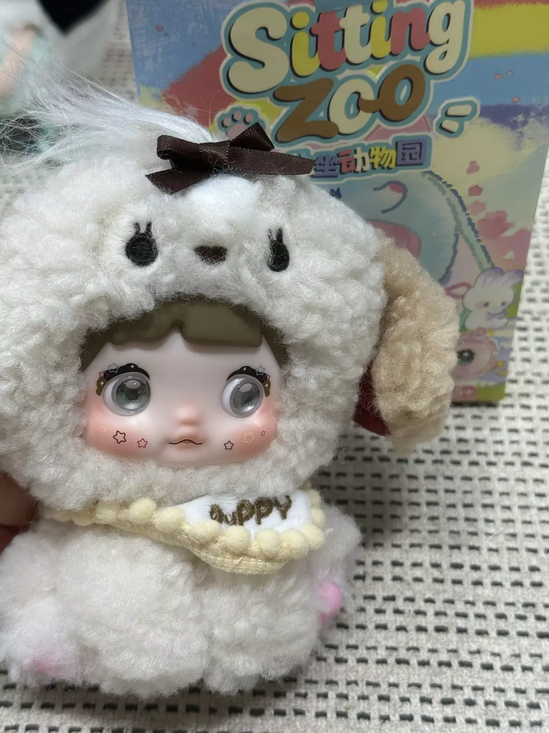 nommi cotton puff thumbnail